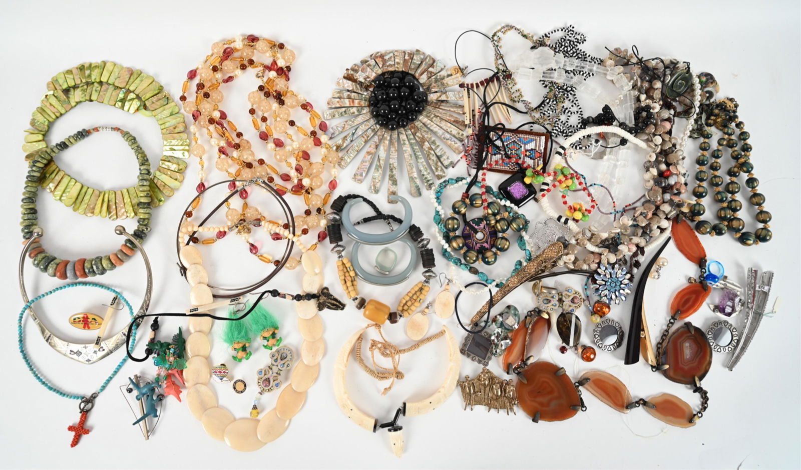 GROUPING OF COSTUME JEWELRY & FINDINGS: Grouping of jewelry and findings in various materials including rock crystal, turquoise, freshwater pearl, abalone, and much more. A few signed pieces. Dimensions: (Largest, agate slice lariat necklac