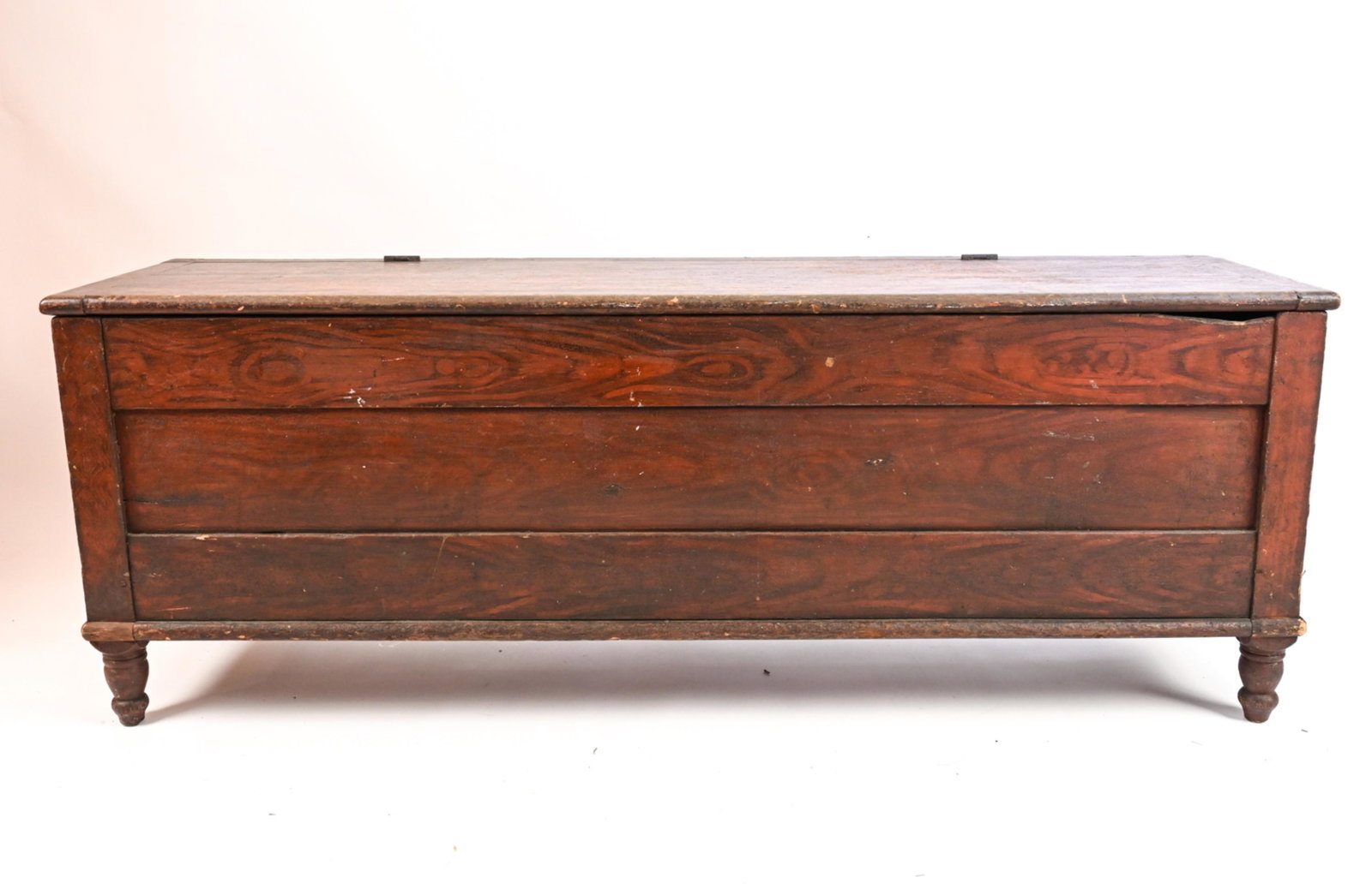 ANTIQUE BLANKET CHEST: With tongue and groove joints. Dimensions: H 22" x W 60.75" x D 16.5" Condition: Losses to finish, scuffs and scratches. Some natural splits to wood.