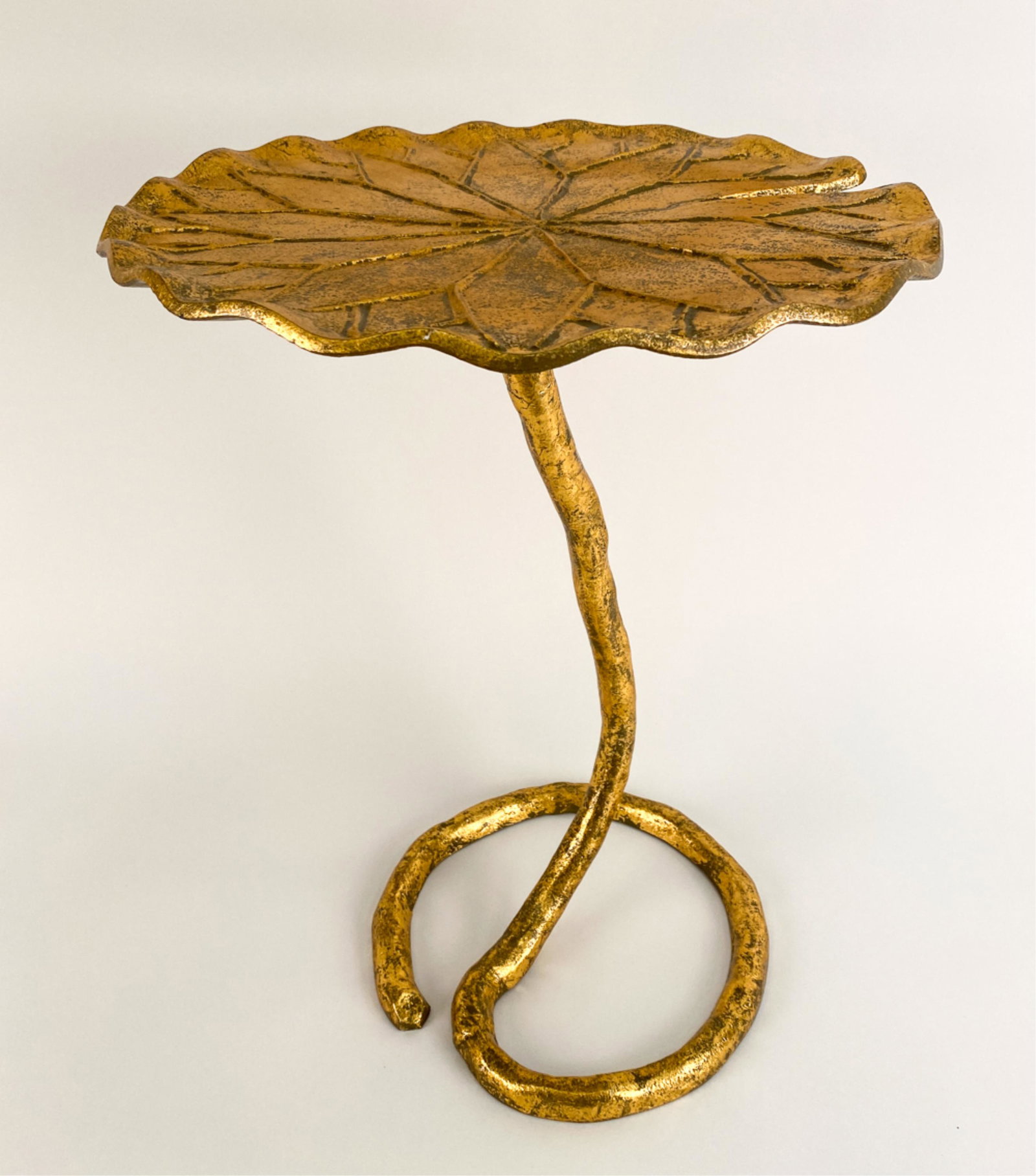 CONTEMPORARY GOLD-TONE METAL LOTUS LEAF TABLE: Apparently unmarked. Dimensions: H 22" x Dia. 15" Condition: No issues to note.