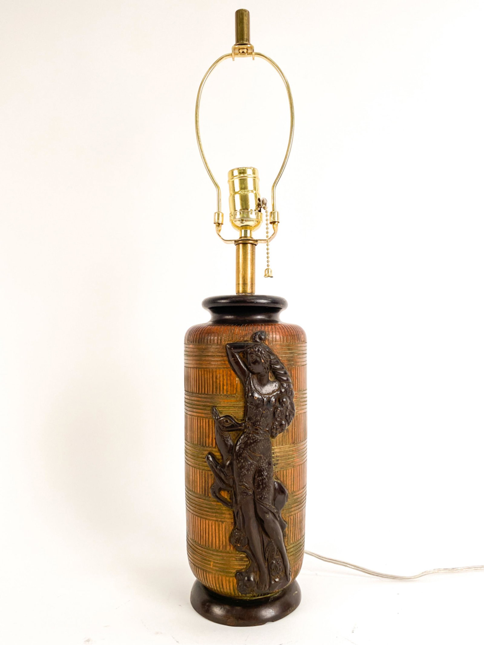 UGO ZACCAGNINI CERAMIC CLASSICAL RELIEF LAMP: Italian modern ceramic lamp with scratch textured body and relief of Classical female figure and deer. Signed with Z marking and marked Italy underneath. Dimensions: H (to socket) 17.5" x Dia. 4.75" C