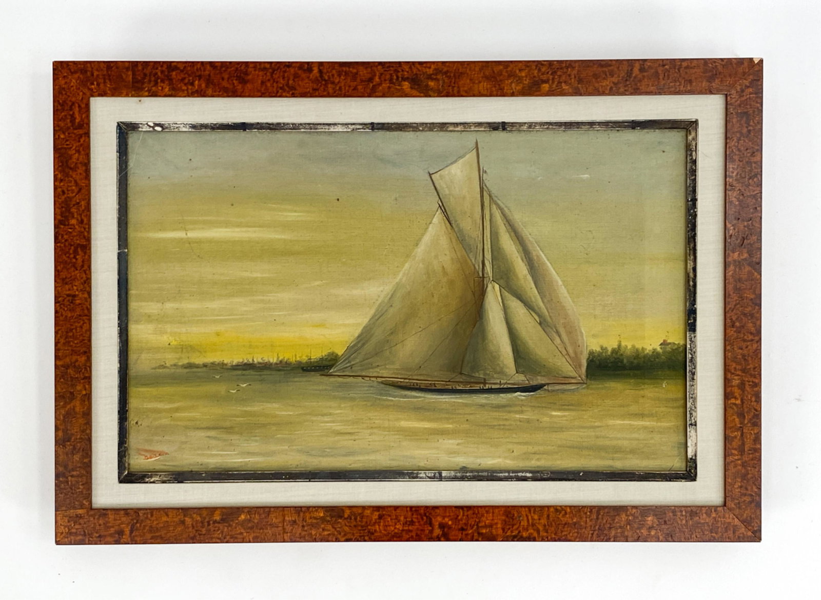 ANTIQUE BRITISH YACHT PAINTING: Oil on canvas. British canvas maker. Yacht in front of landscape. Indistinctly signed lower right. Dimensions: (Frame) H 13.75" x W 19.5" (Canvas) H 9.5" x W 15.5" Condition: Surface soiling, nicks to