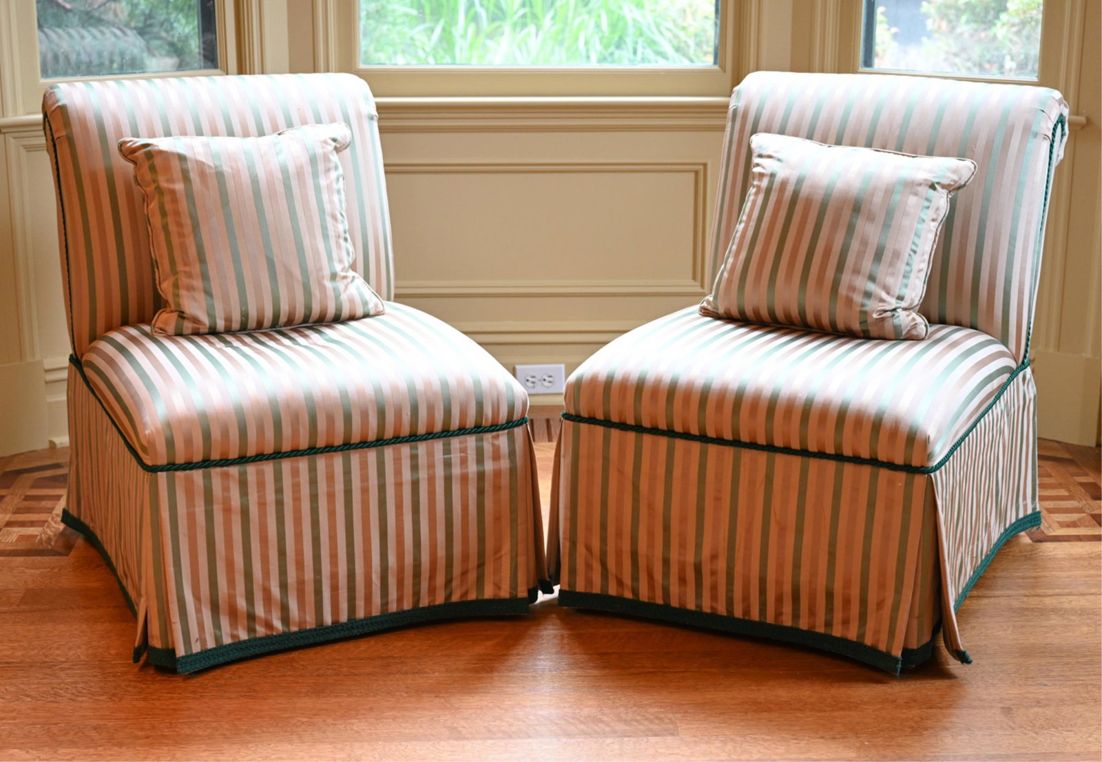 PAIR OF SILK SCROLL-BACK SLIPPER CHAIRS: Silk-blend striped fabric slipper chairs with scroll backs. No labels. Dimensions: H 32.5" x W 24.25" x D 31" x SH 17" Condition: Few spots of soiling to fabric.
