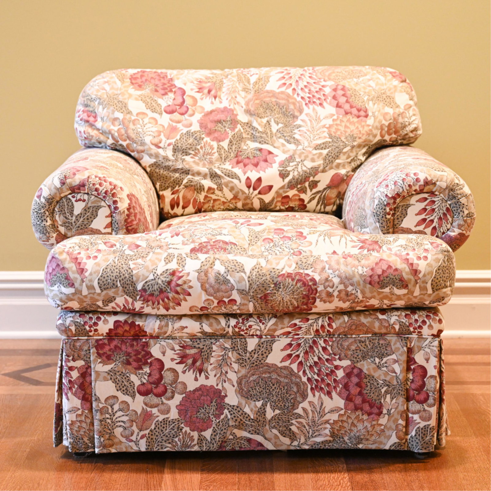 WAYSIDE CUSTOM ROLLED-ARM CLUB CHAIR: Custom upholstered and skirted in tropical linen canvas, with down blend-filled seat cushion. Labeled Wayside of Milford under seat. Dimensions: H 31" x W 38" x D 39" x SH 18" Condition: Light sun fad
