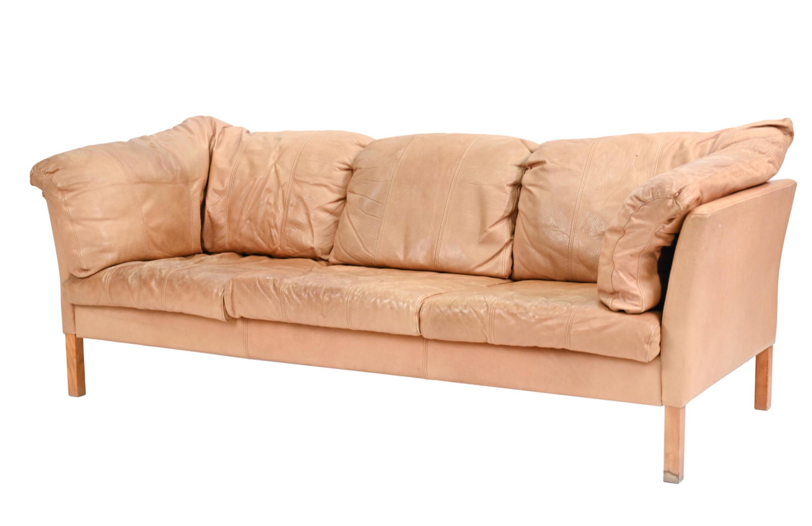 DANISH MID-CENTURY STOUBY LEATHER SOFA: Marked Stouby to backsides of cushions. In camel-colored leather. Dimensions: H 26" x W 78.5" x D 33" x SH 16" Condition: Some tears to backside and underside lining of cushions/seat. Some discolorati
