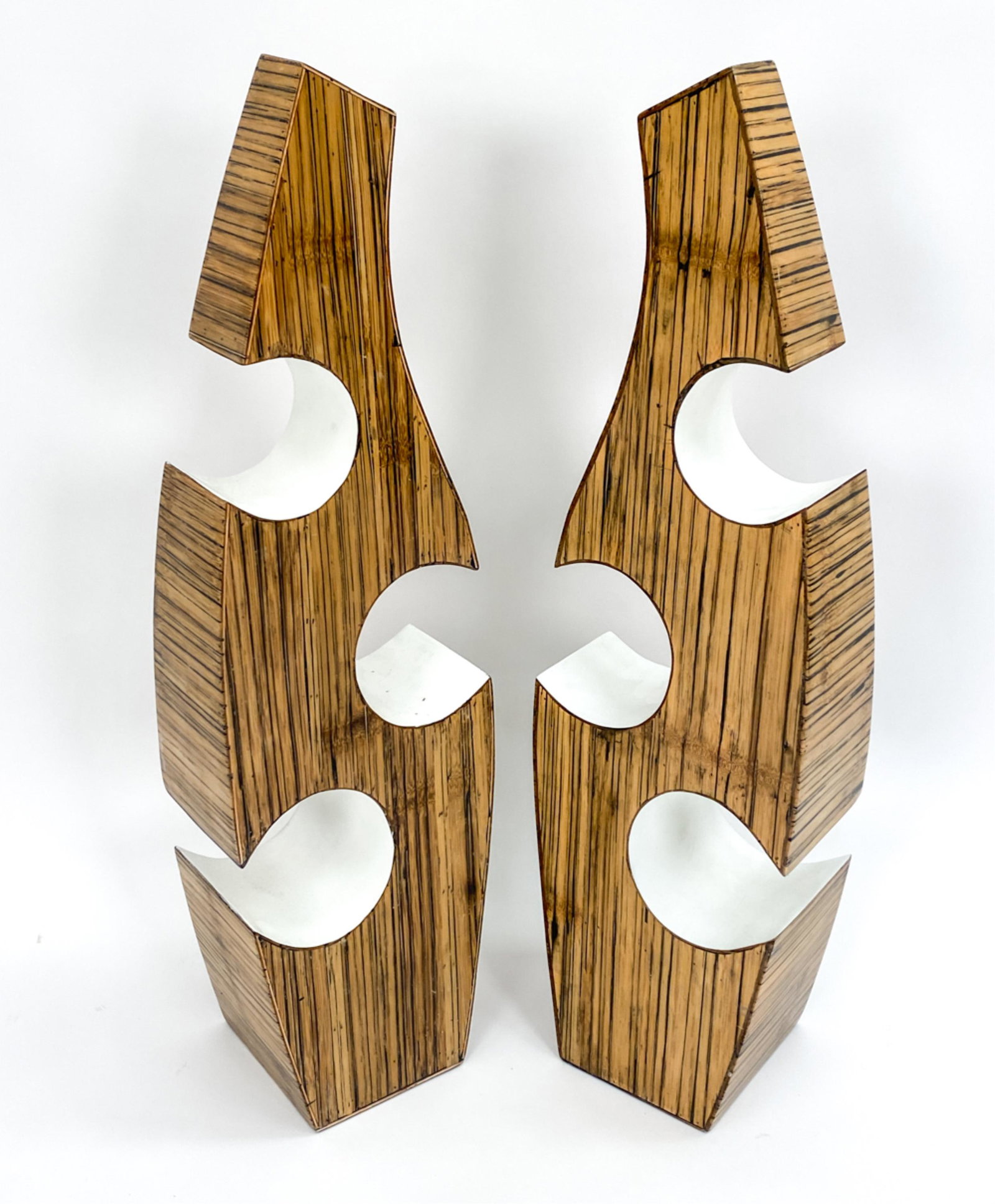 PAIR OF WOODEN SCULPTURES: With painted wood grain exterior. Dimensions: H 39" X W 11" x D 6.25" Condition: Losses to paint, various nicks and dings.