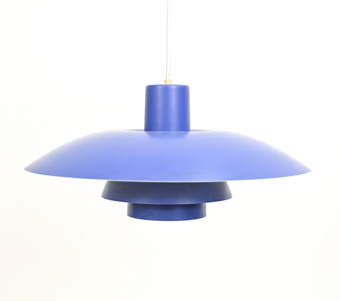 LOUIS POULSEN PH 4/3 BLUE PENDANT LIGHT: With Louis Poulsen label. Model 17094. With blue power-coated finish. Designed by Poul Henningsen. Dimensions: H 7" x Dia. 16.5" Condition: May need rewiring. One spot of paint loss to rim.