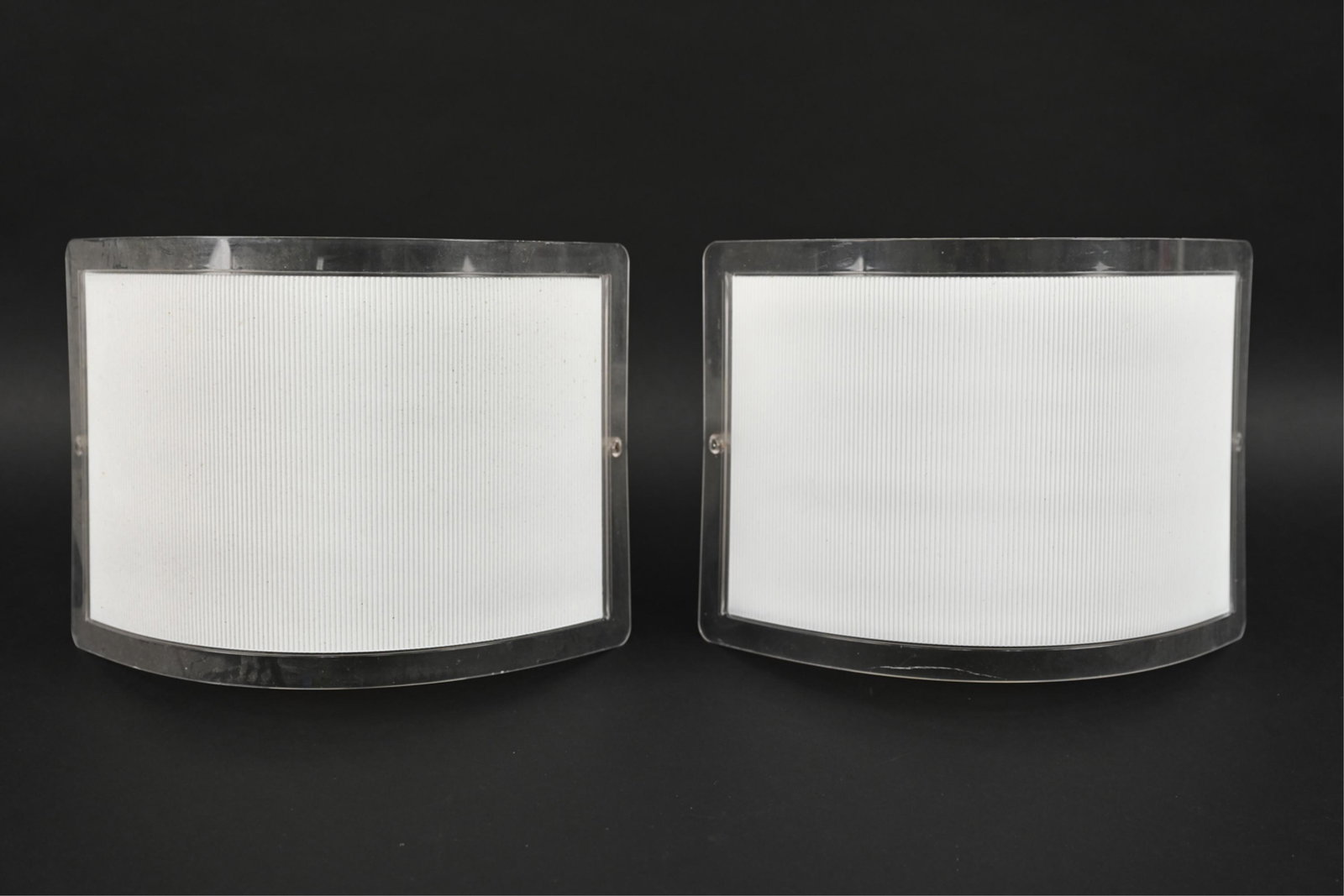 PAIR OF MID-CENTURY LUCE PLAN ITALIAN SCONCES: Marked: Meda / Rizzatto Design, Luce Plan, Made in Italy. Dimensions: H 8.5" x W 11.5" x D 8" Condition: May need rewiring. Scuffs and scratches. Some light surface dust. S027