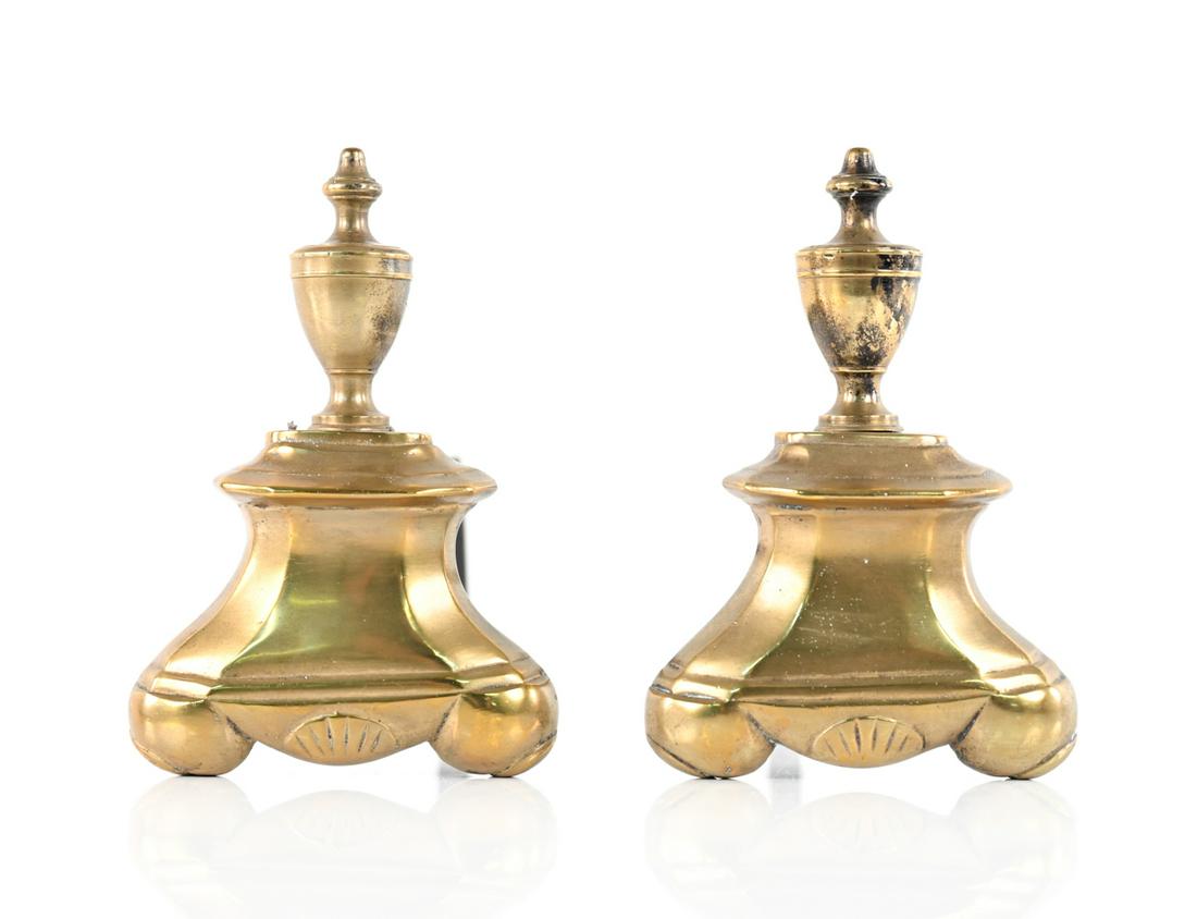 PAIR OF PETITE BRASS ANDIRONS: Dimensions: H 8" x W 5.5" x D 13.5" Condition: Legs possibly replaced. Patina and wear consistent with age and use.