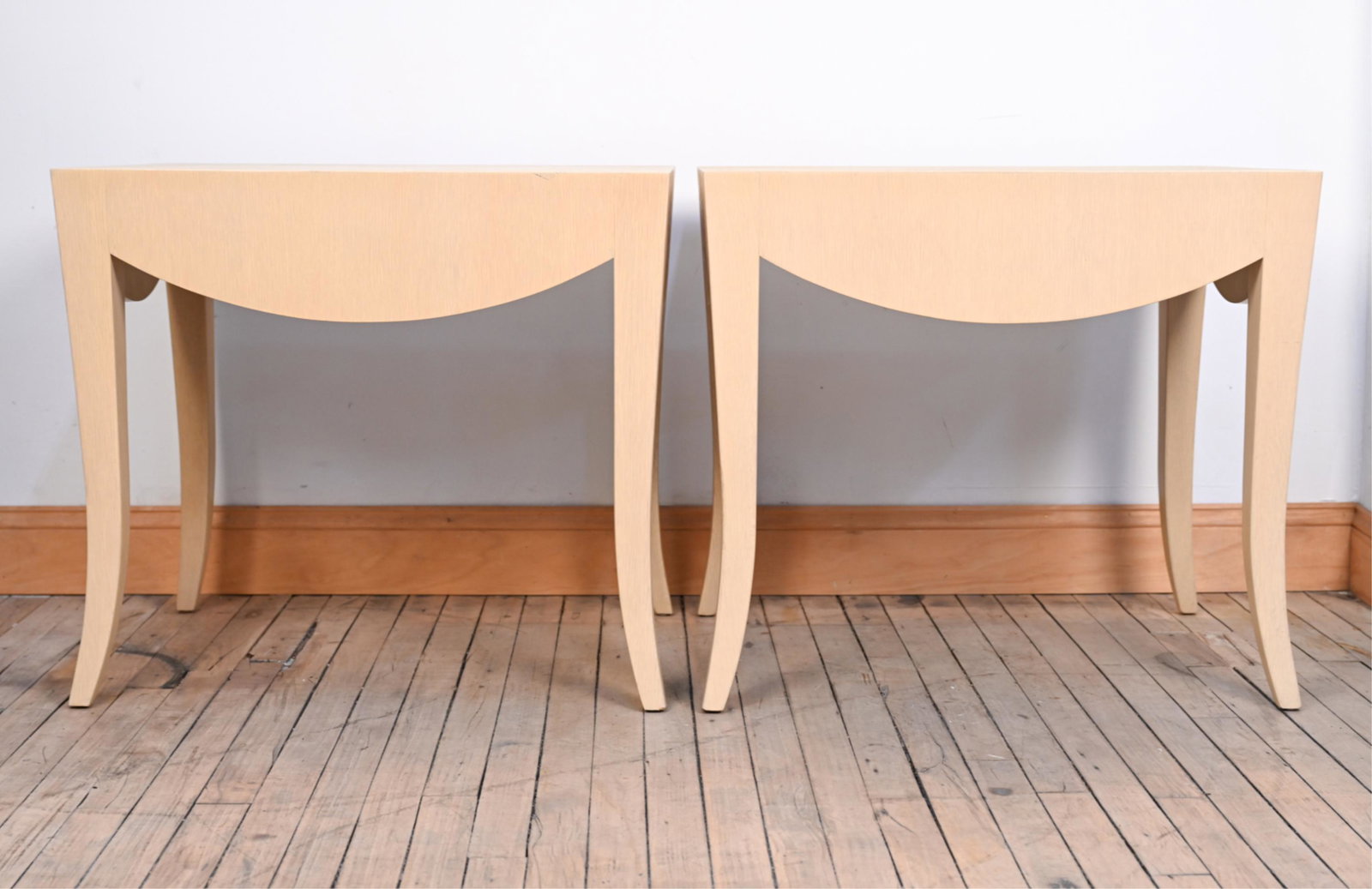 PAIR OF MODERN SKIRT SIDE OR END TABLES: Dimensions: H 25" x W 28" x D 20.25" Condition: Showing light wear consistent with age and use.