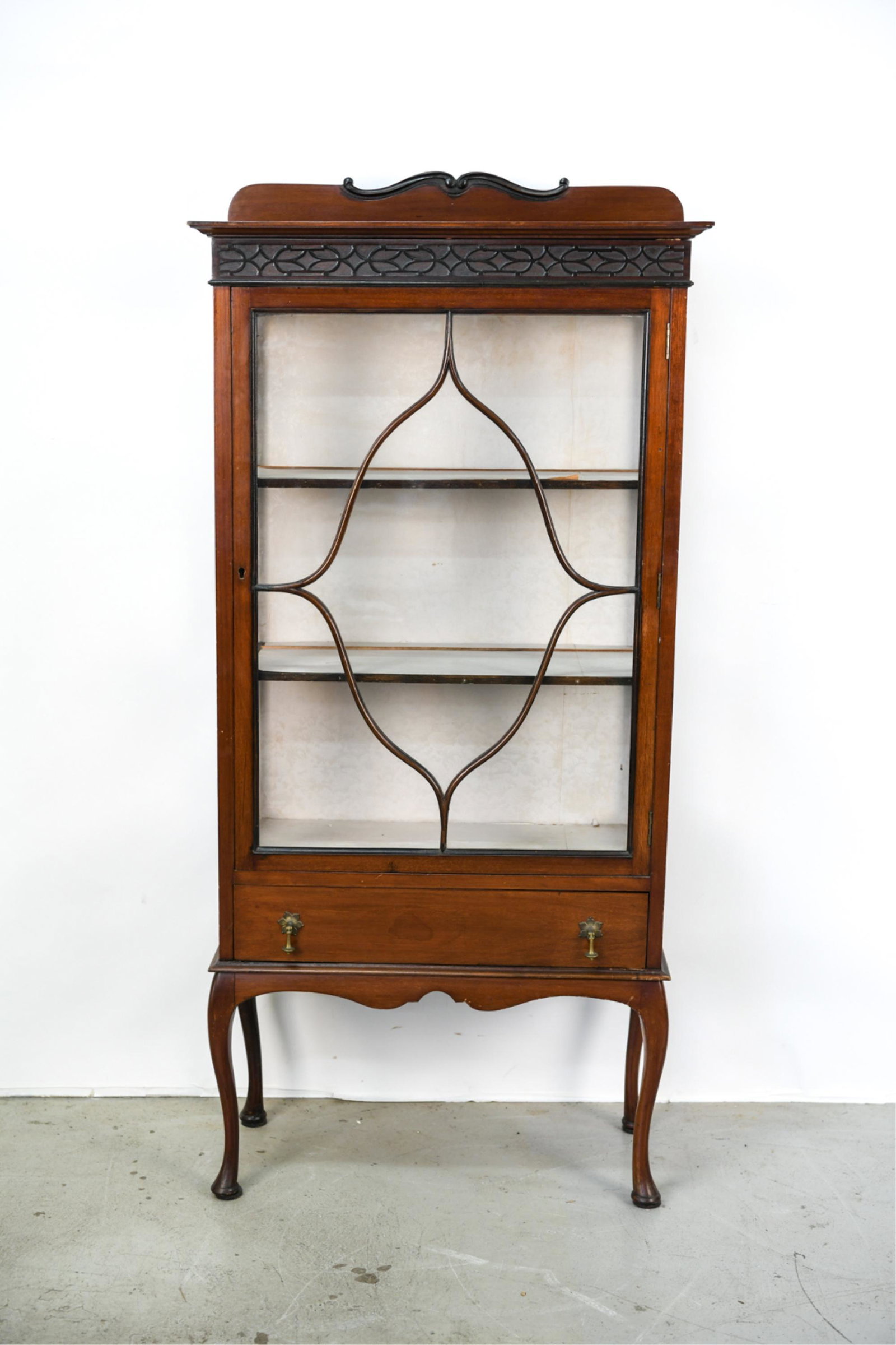 AMERICAN MAHOGANY CURIO / VITRINE CABINET: Original wavy, antique glass, no key. Dimensions: H 64" x W 30" x D 13.5" Condition: Separation to joints, needs tightening to be sturdy. Few nicks, dings, scratches, and scuffs. Glass with small brea