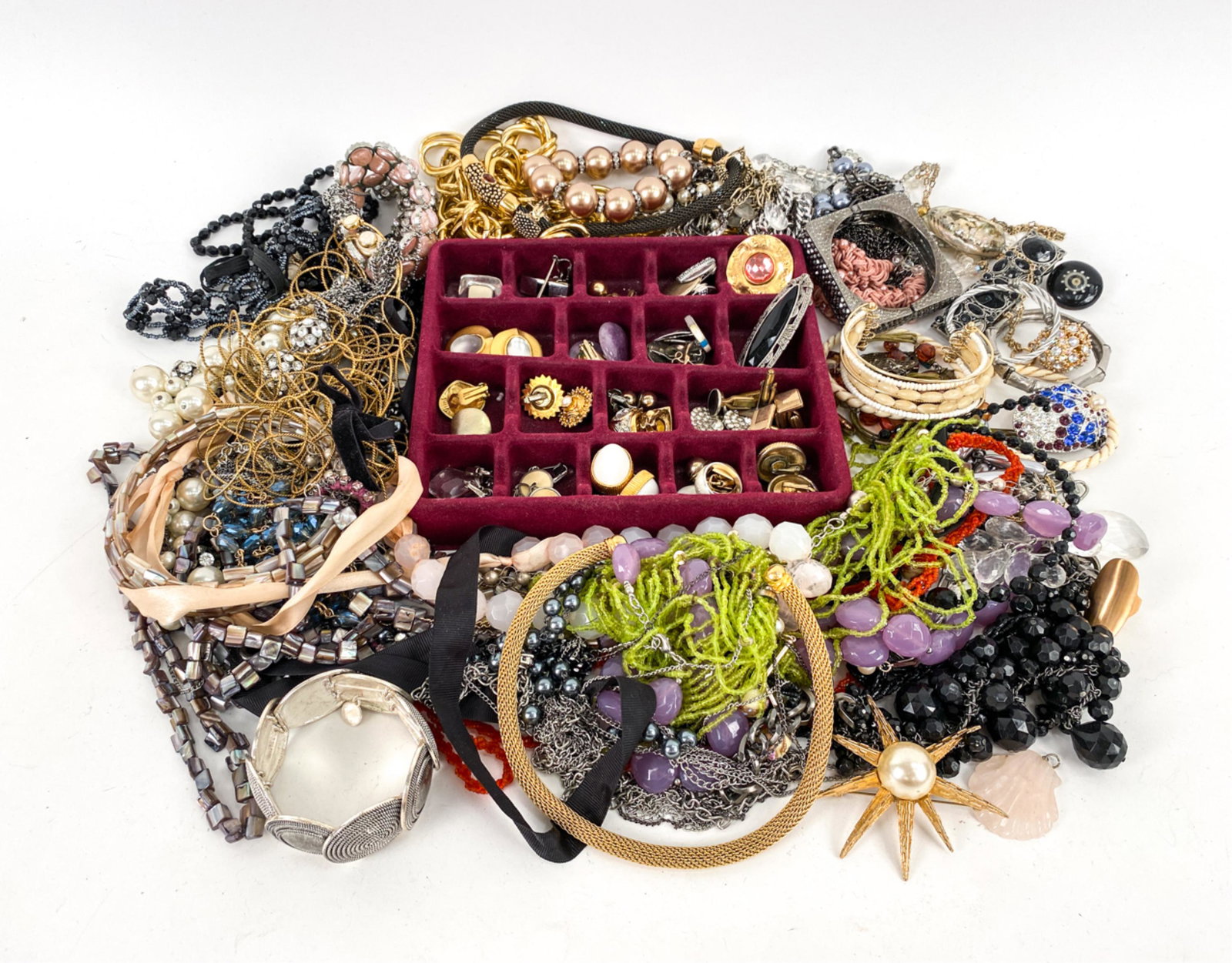 GROUPING OF VINTAGE COSTUME JEWELRY: Including several signed pieces by Trifari, Kenneth Jay Lane, and various others. Dimensions: (Large goldtone chain necklace) L 21" x W 1.25" Condition: Showing various signs of wear consistent with a