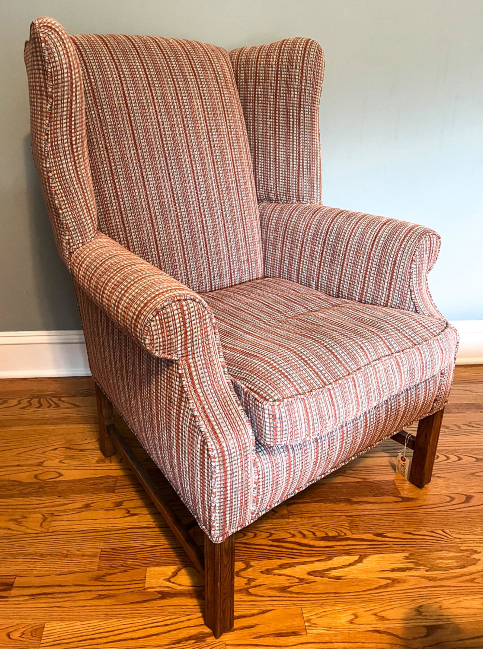 WINGBACK ARMCHAIR: Dimensions: H 42" x W 31.5" x D 30" SH 19" Condition: A few light nicks to frame. Some pulls to fabric.
