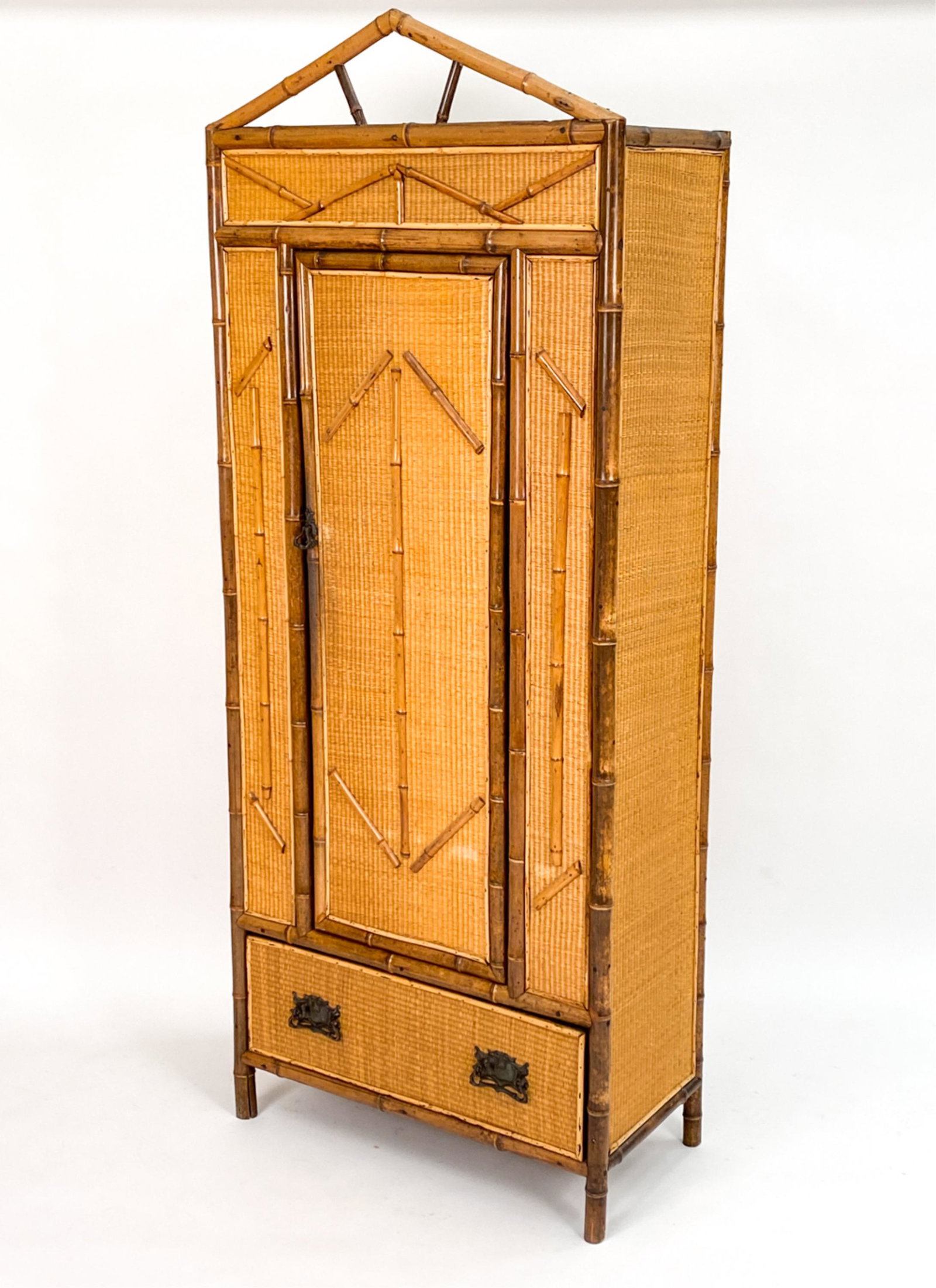 RATTAN & BAMBOO LINEN PRESS CABINET: Top interior shelf fitted with hooks. Dimensions: H 81.25" x W 33" x D 16.5" Condition: Some hardware slightly loose. Light wear consistent with age and use including some finish wear.