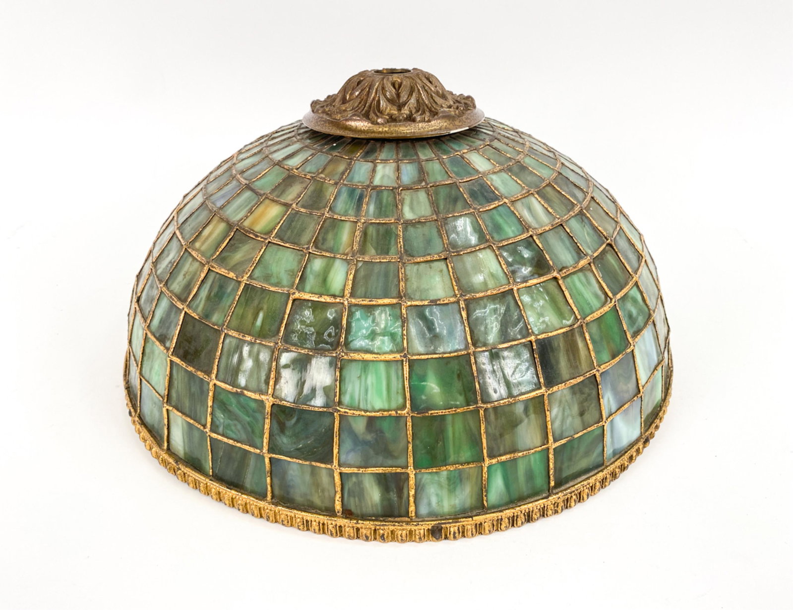 HANDEL SLAG GLASS SHADE: Shades of green. Apparently unmarked. Dimensions: H 8.5" x Dia. 18" Condition: Some flattening. Various panes with cracks and losses.