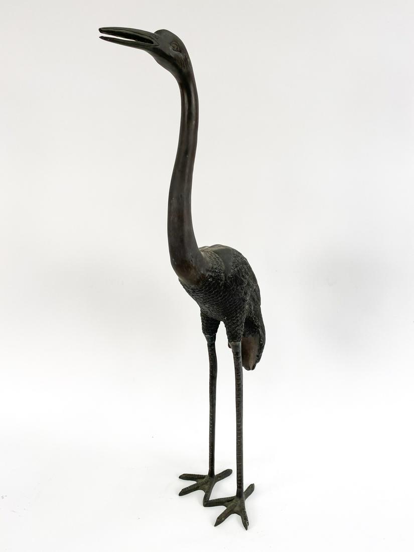 VINTAGE ASIAN CAST BRONZE CRANE: Unmarked. Dimensions: H 38.5" x W 19" x D 6" Condition: A few spots of surface wear.