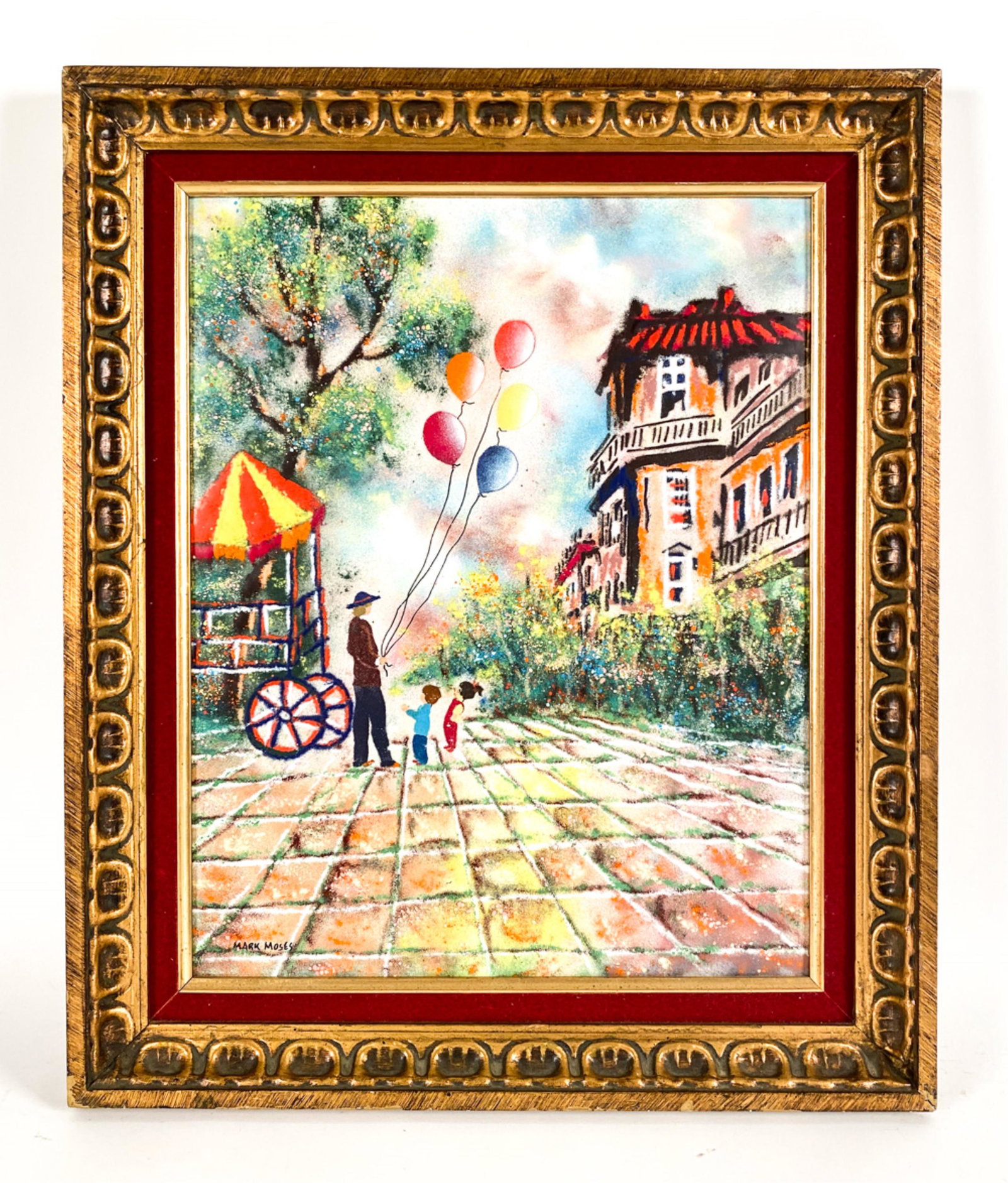 LARGE MARK MOSES PARIS ENAMEL: Enamel of a balloon seller with children. Signed lower left. Dimensions: (Frame) H 25.5" x W 21", (Enamel) H 20" x W 16" Condition: Some rubbing to the frame.
