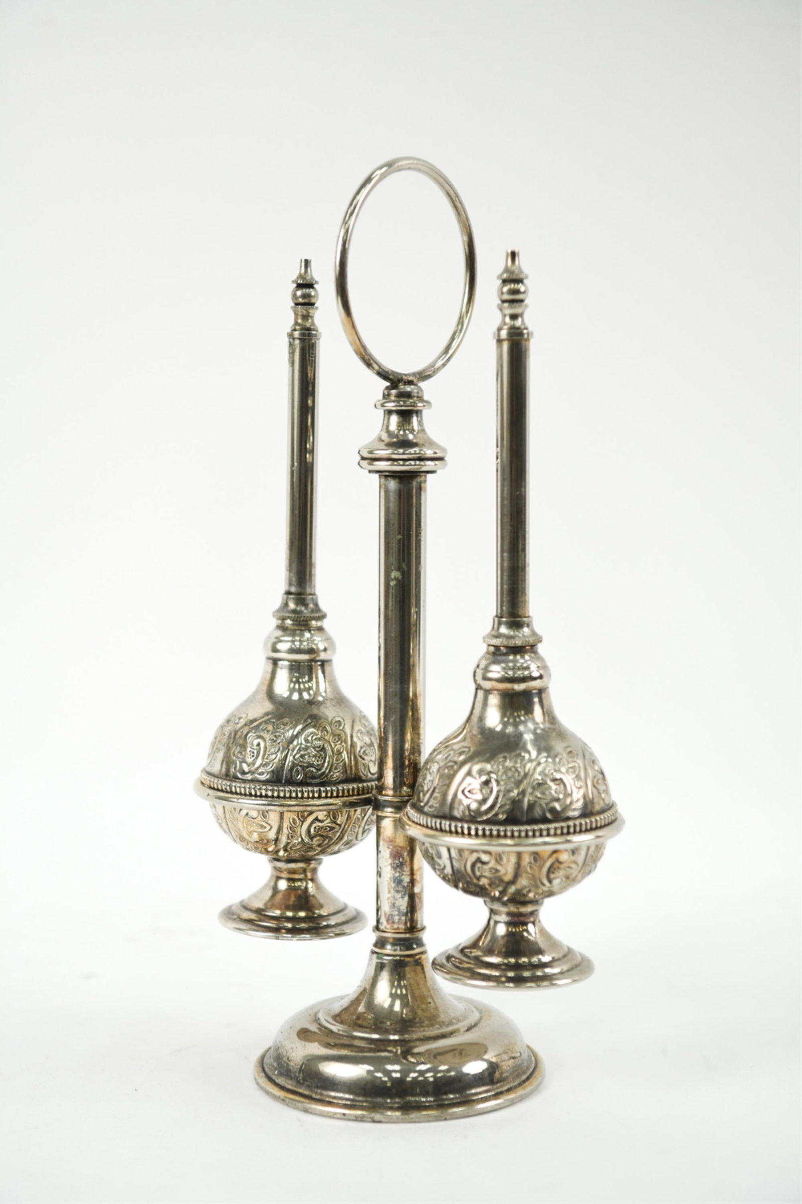 ISLAMIC TURKISH DOUBLE ROSEWATER SPRINKLERS: Signed underneath each piece. Dimensions: H 13.5" x W 7" x D 4.5" Condition: Surface tarnish and wear.