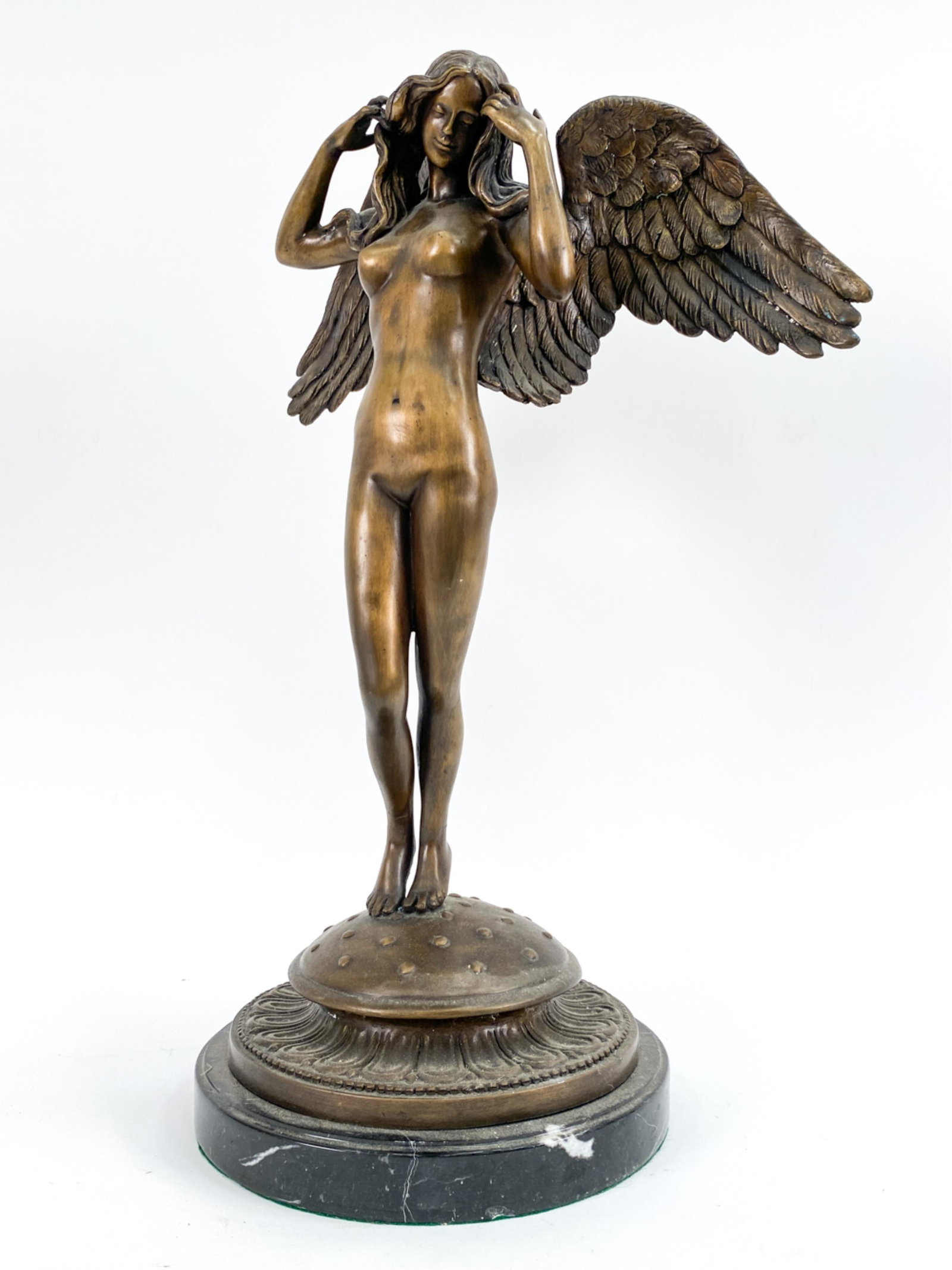 NEOCLASSICAL-STYLE BRONZE WOMAN W/ ANGEL WINGS: Contemporary Apparently unmarked. On marble base. Dimensions: (Incl. base) H 25" x W 12" x D 14" Condition: Some surface inconsistencies.
