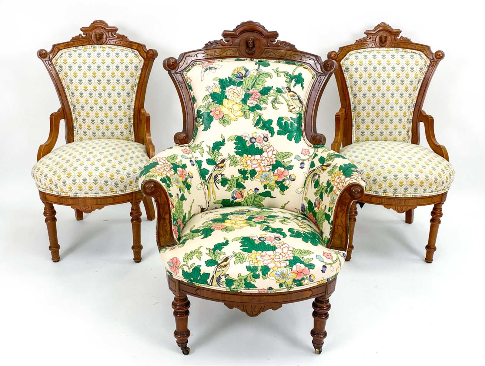 (3) VICTORIAN EASTLAKE CARVED WOOD CHAIRS: Crowns carved with bust of man with feathered cap. Dimensions: (Largest) H 39" x W 29.5" x D 30" x SH 16" Condition: Wooden frames with scratches, scuffs, dings. Few spots of very light soiling. Wear 