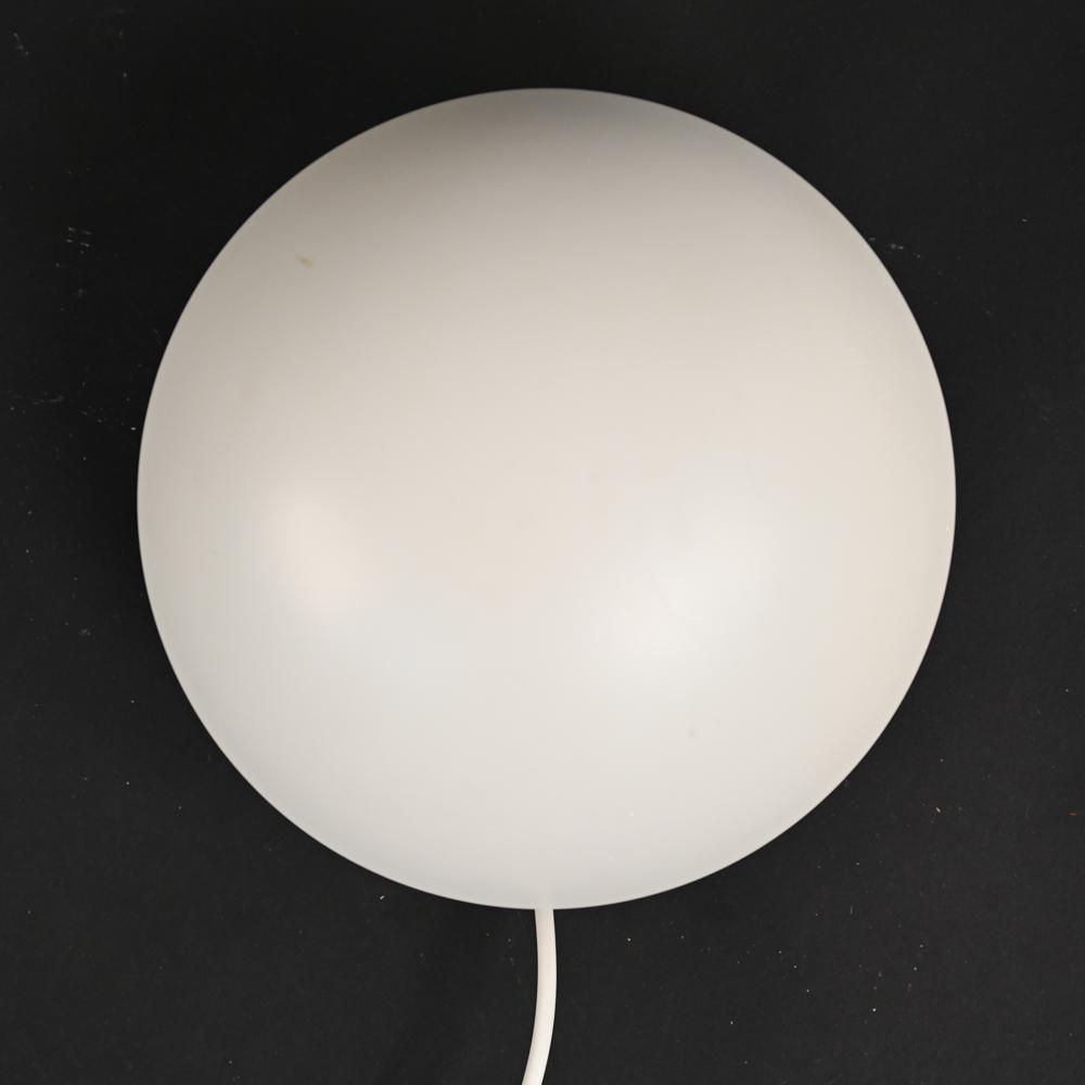 POUL HENNINGSEN LOUIS POULSEN PH-HAT MINI SCONCE: Small "PH-Hat" wall sconce, designed by Poul Henningsen for Louis Poulsen, c. 1970's Features adjustable tilting half-dome shade in white and pink lacquered metal. Labeled on canopy and shade. Dimensi