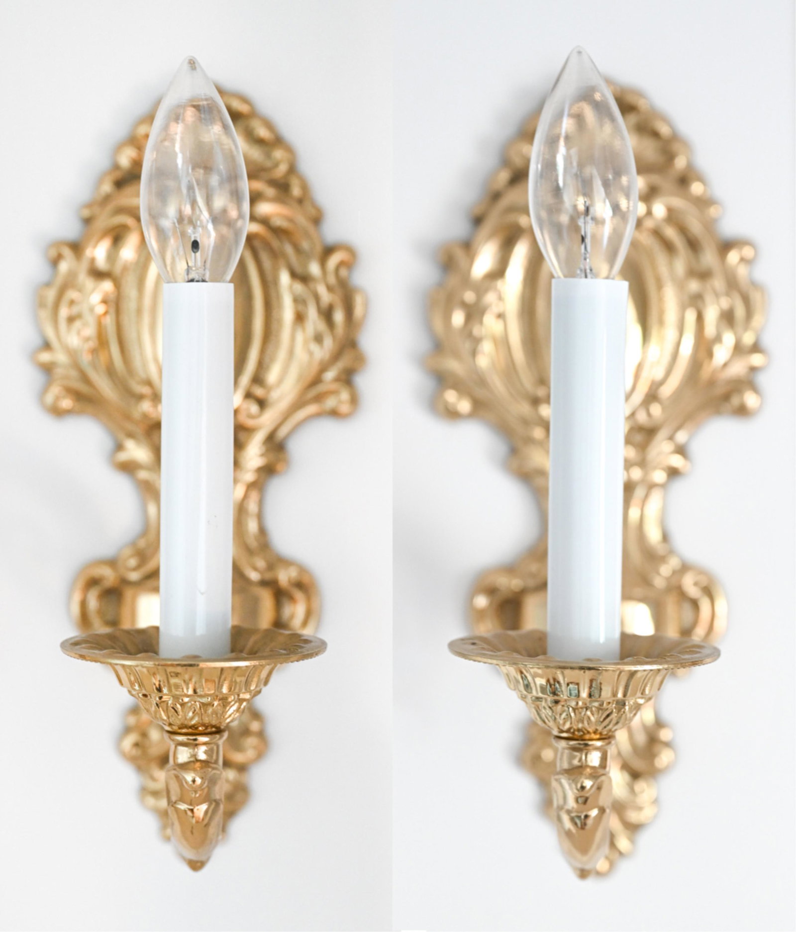 PAIR OF BRASS SCONCES: Dimensions: H 11.5" x W 5" x D 8" Condition: Wiring functional. A few small scuffs and rubs to metal.