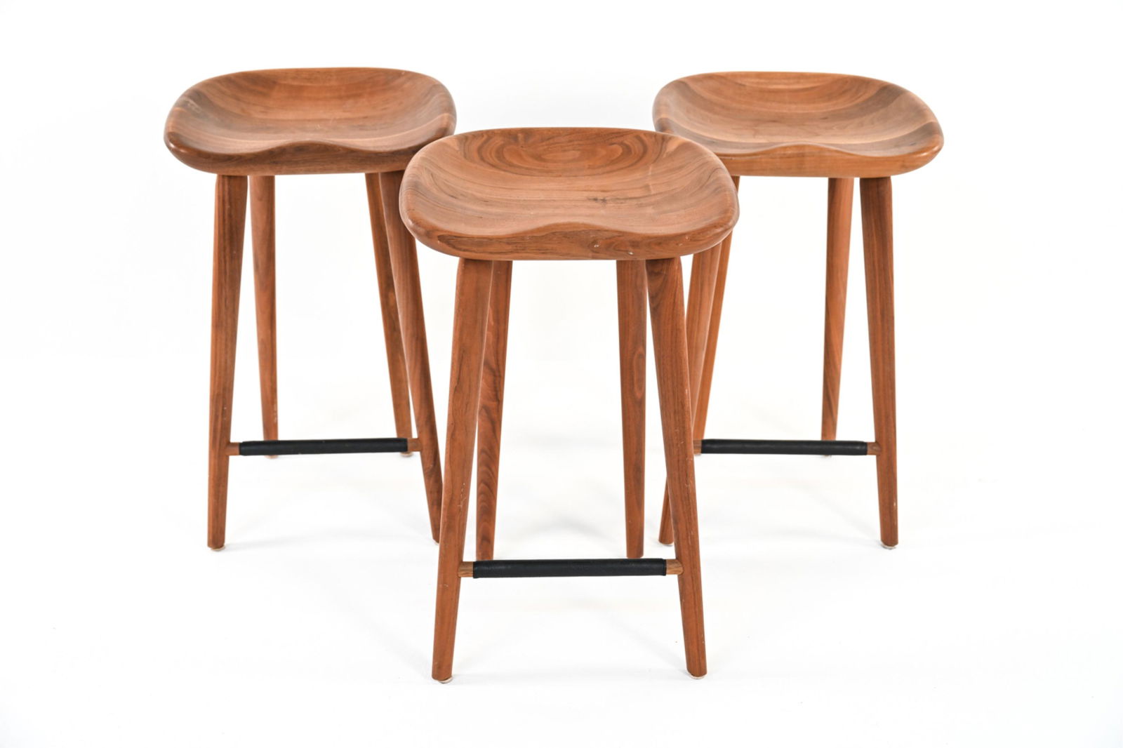 (3) BASSAMFELLOWS CB-22 TRACTOR COUNTER STOOLS: Stamped underneath. Dimensions: H 27" x W 17" x D 13.25" Condition: A few small water spots and spots of soiling to seats; scattered small scuffs and rubs to legs.