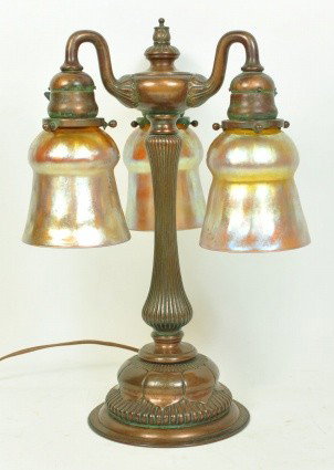 TIFFANY STUDIOS THREE LIGHT TABLE LAMP: WITH L.C.T. FAVRILLE GLASS SHADES. Measures; 16.5" tall