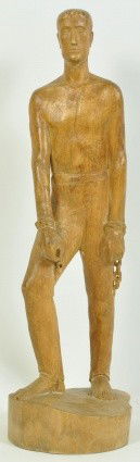 CARVED WOODEN MAN BREAKING FREE OF CHAINS: Measures: 17" tall