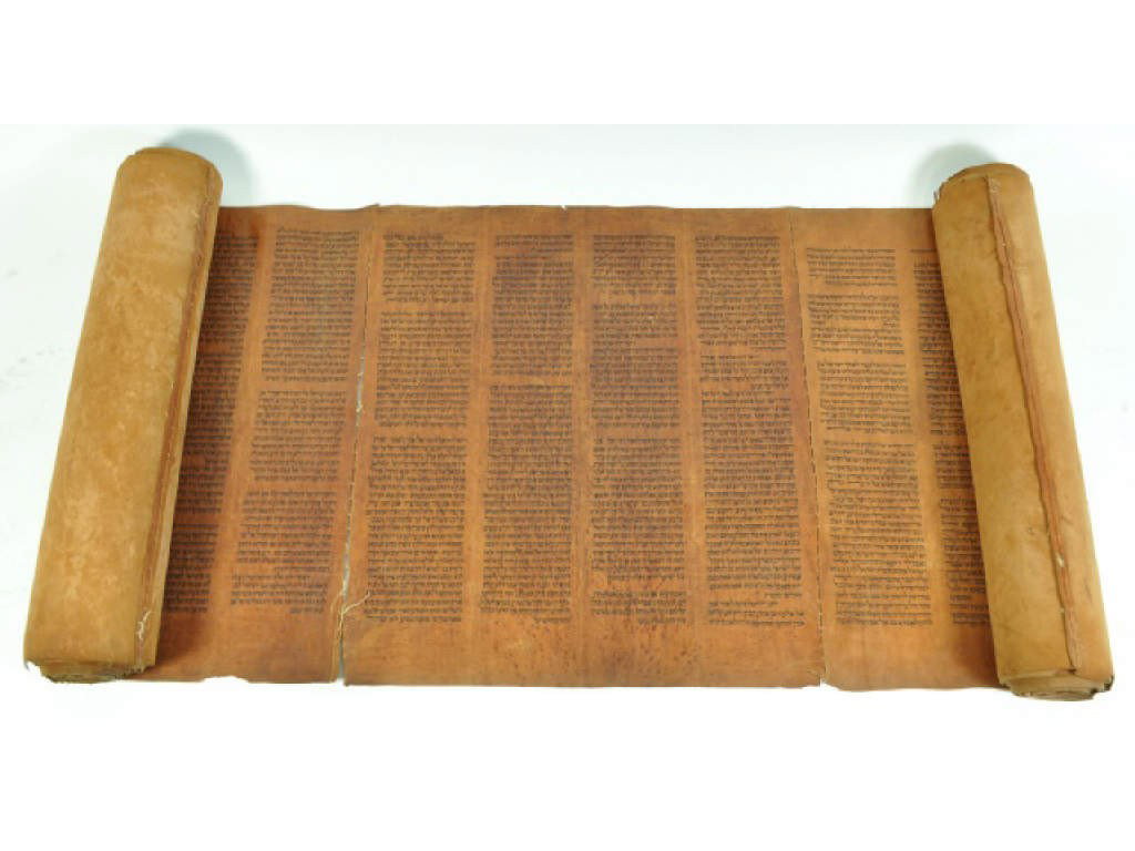 EARLY 19TH C. YEMENI TORAH SCROLL: Contains all five books of Moses, written on a red deer skin. The scroll was written by a sole scriber, and was used in a Yemeni synagogue