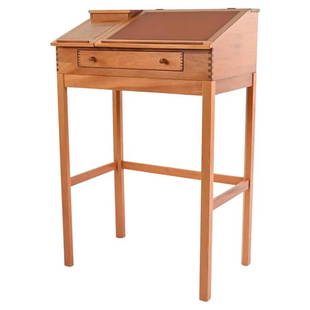 ANDREAS HANSEN CHERRY WOOD STANDING DESK: A Danish mid-century tall free-standing desk in blonde cherry wood with beautiful exposed dovetail joints. Featuring a brick red leather flip up top, single drawer, and fitted interior. With Form 75