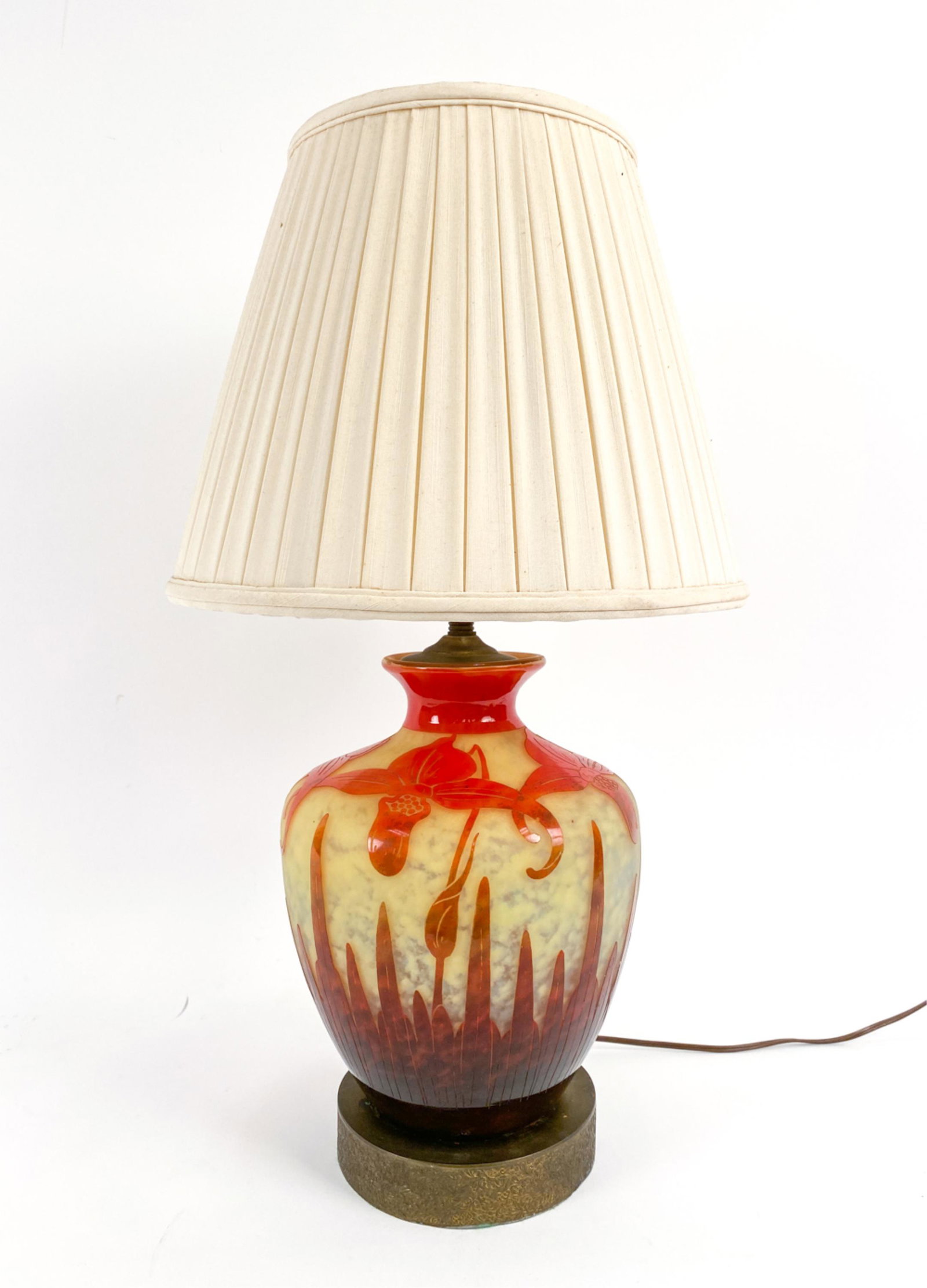 LE VERRE FRANCAIS CAMEO GLASS VASE, AS LAMP: Floral cameo glass vase, mounted as lamp. Signed Le Verre Francais to lower edge. Dimensions: (Incl. shade) H 25", (Vase) H 11.5" x Dia. 9" Condition: Not tested. Few spots of patina to brass base. Fe