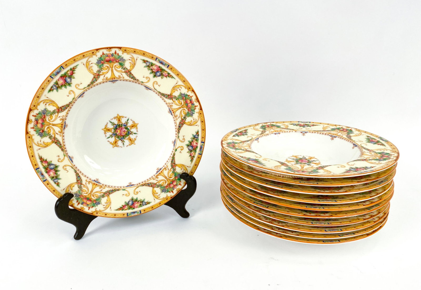(11) ROYAL WORCESTER "BUCKINGHAM" BOWLS: (11) Antique shallow bowls in yellow "Buckingham" pattern by Royal Worcester, marked underneath. Dimensions: H 1.25" x Dia. 9" Condition: One with crack through body. Few light rubs.
