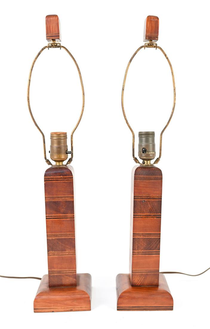 PAIR OF MID-CENTURY WOOD LAMPS: Banded stacked wood lamps in the style of Gordon and Jane Martz for Marshall. Apparently unsigned. Dimensions: H (to finial) 21.75" x W 4.5" x D 4.5" Condition: Wiring not tested. Oxidation to metal;
