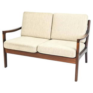 OLE WANSCHER FOR P. JEPPESEN "SENATOR" LOVESEAT: From its sculpted paddle-style armrests to the subtle organic lines of its frame, the iconic "Senator" sofa by Ole Wanscher is a masterpiece of Danish Mid-Century design. This example checks all the b