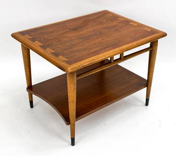 ANDRE BUS FOR LANE ACCLAIM TWO TIER SIDE TABLE: Mid-century side or end table designed by Andre Bus for Lane Furniture. Walnut and oak, 1965. Dimensions: H 20" x W 28" x D 21" Condition: Some water marks to top. Signs of age and use.