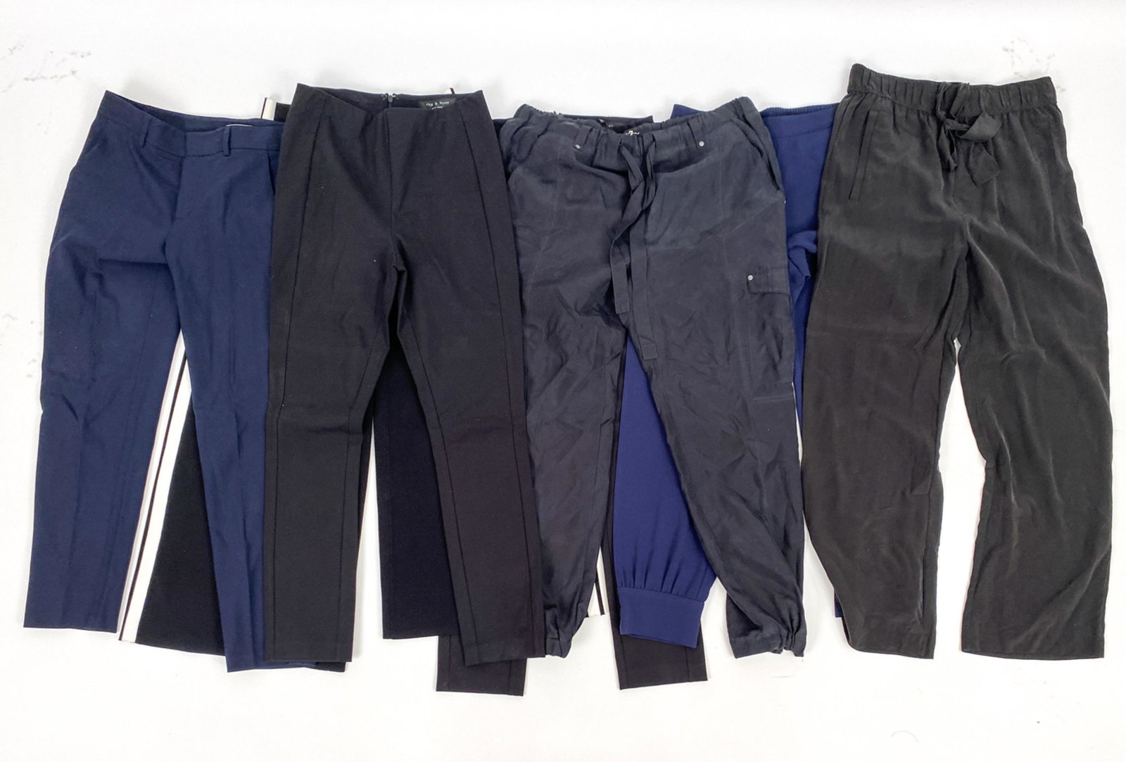 GROUPING OF DESIGNER TROUSERS INCL. VINCE, S/M: (6) Pairs in total. Including: Veronica Beard track stripe knit culottes, size S/M; Jac & Jack black silk pant, approx. size 28; Drew navy crepe ankle button jogger, size US 4; (2) pairs of Rag & Bone