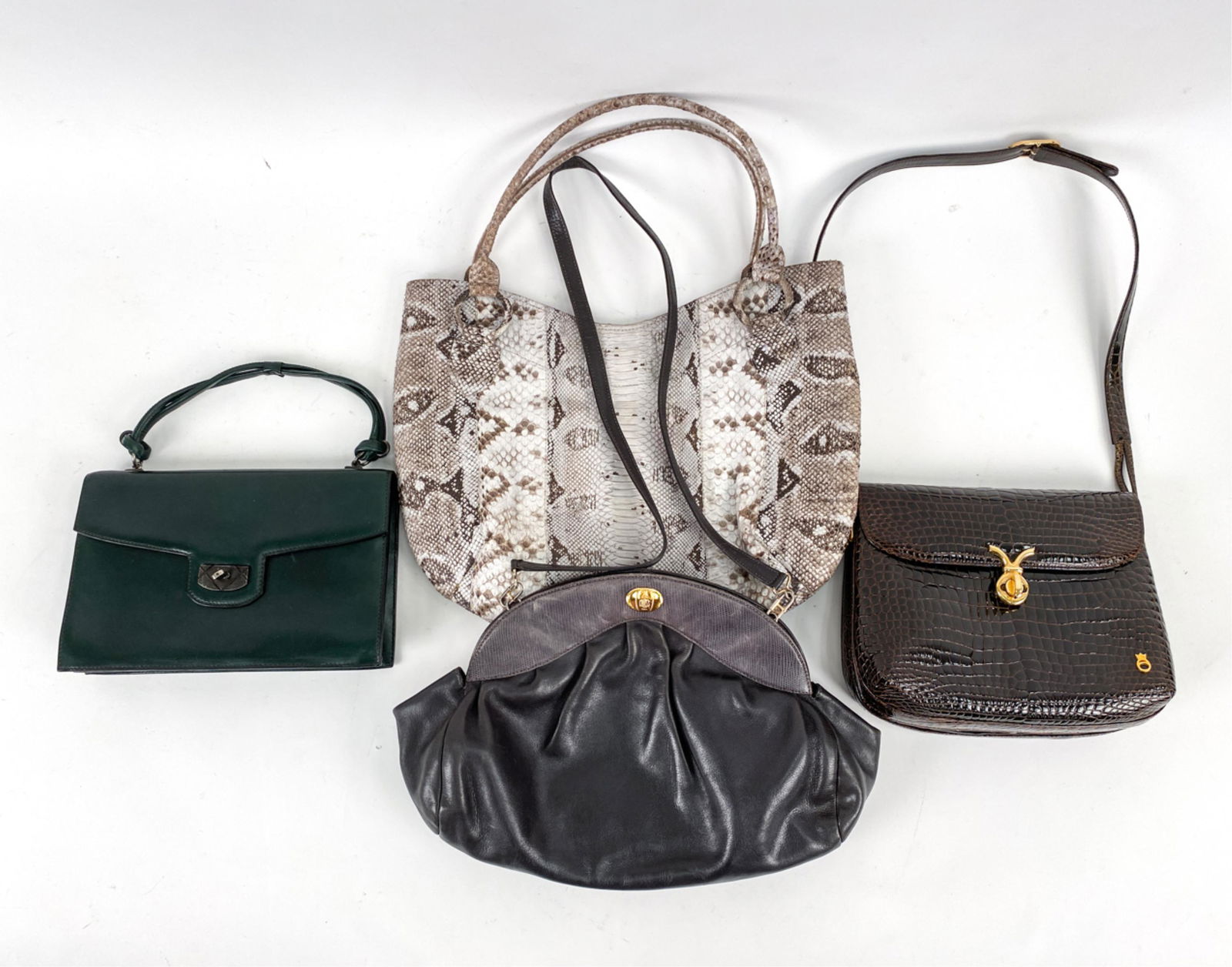 GROUPING OF VINTAGE PURSES INCL. EXOTIC LEATHER: Including: Fred Paris patent-finished crocodile leather flap shoulder bag, Franzi green calf leather box-style handbag, Mark Cross gray leather shoulder bag with lizard-trimmed frame; and a python ski