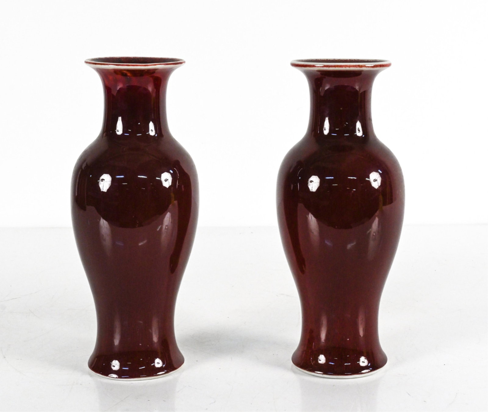 (2) CONTEMPORARY CHINESE OXBLOOD PORCELAIN VASES (1 of 11)