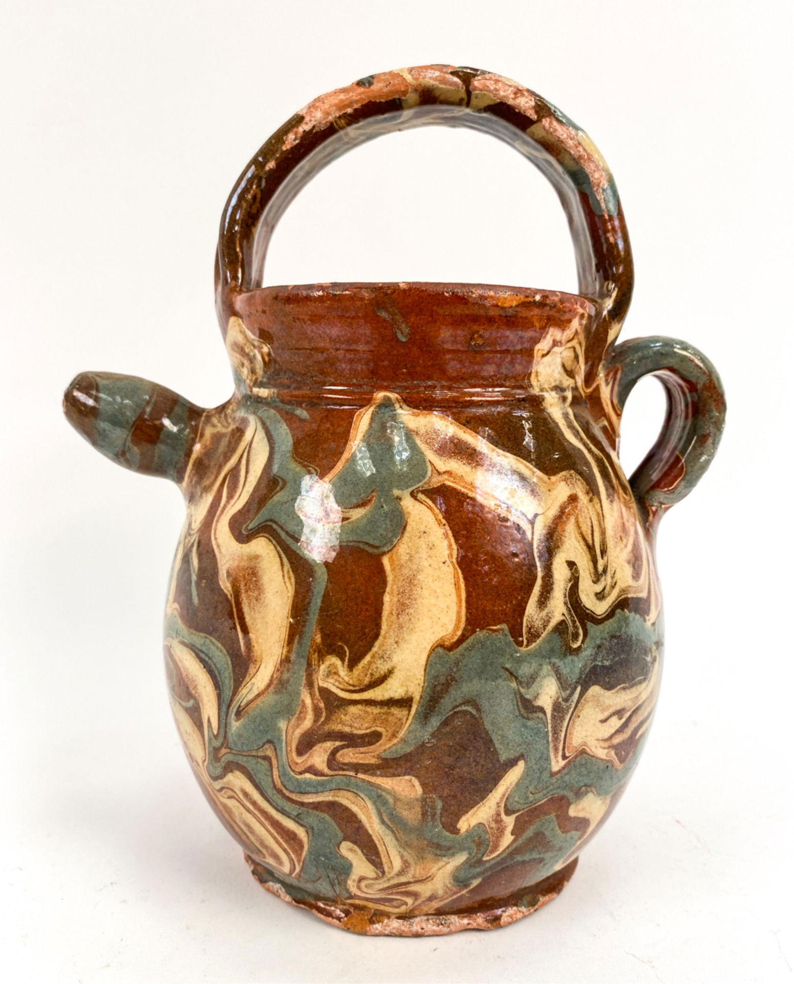 LATE 18TH C. FRENCH ANTIQUE JASPE CRUCHE: Made by Aeginta family. Vallauris. Dimensions: H 8.5" x W 7" x D 5" Condition: Crazing, chips, and glaze losses throughout.