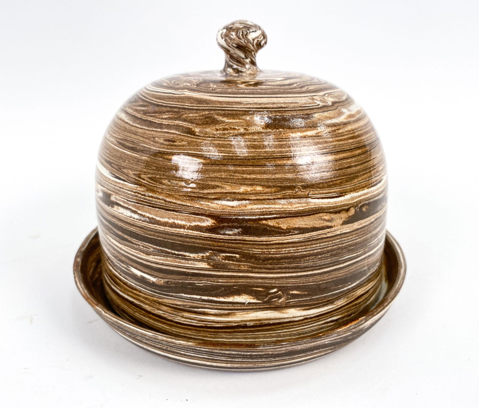 19TH C. FRENCH ANTIQUE MARBLED POTTERY: Terre Melee, marbled clay in one area. Uzes, Pichon. Butter bowl. The top is shaped like a bell. Dimensions: H 5" x Dia. 6.25" Condition: Very minor wear.