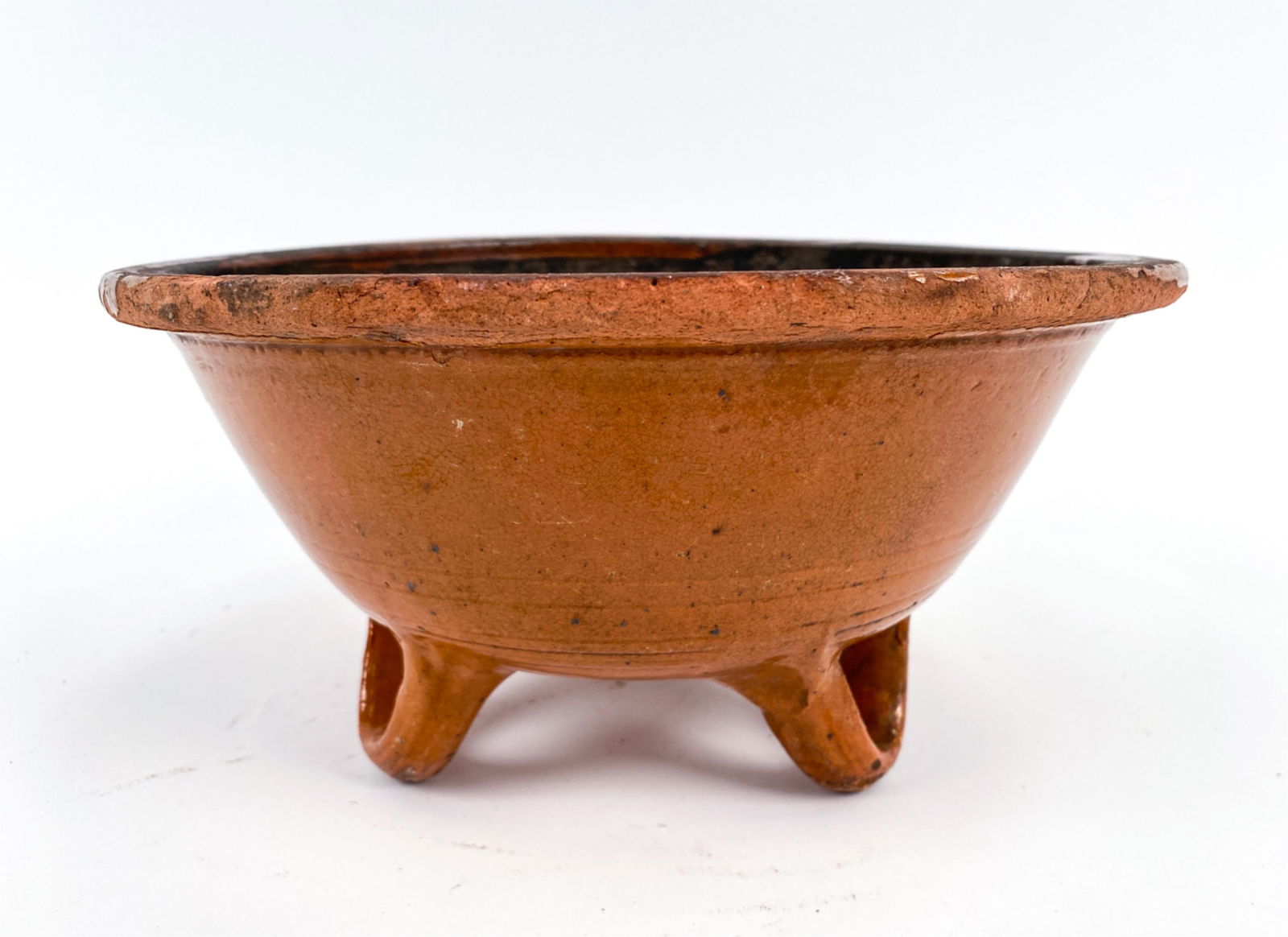 18TH C. FRENCH ANTIQUE ETTOUFIER BOWL: Deep bowl for cooking potatoes at the fire. Beautifully designed with 3 legs elevating the vessel to protect the glaze. Dimensions: H 5.5" x Dia. 10" Condition: Crazing, old chips, and glaze losses th