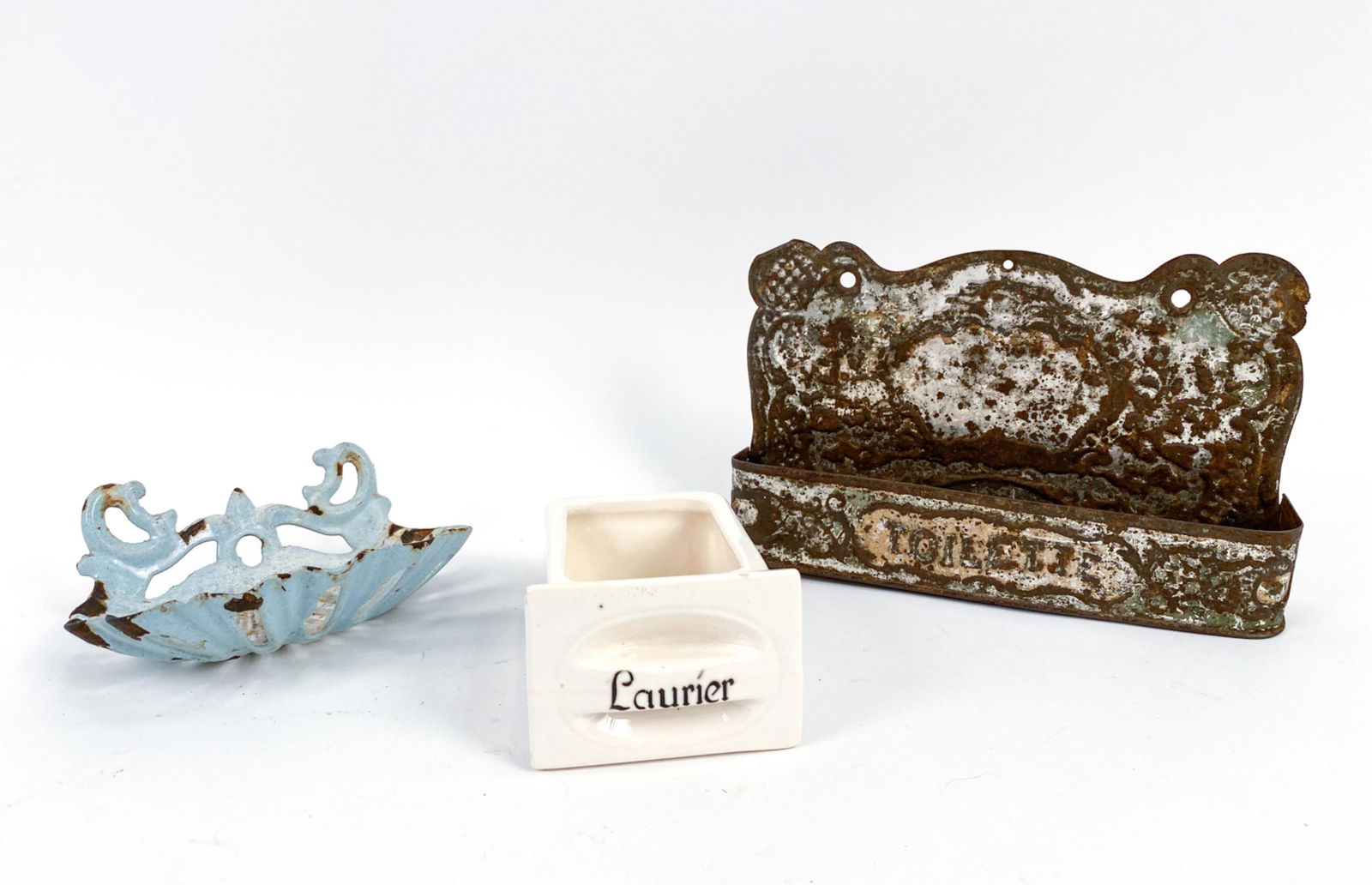 19TH C. FRENCH ANTIQUE TOILETRY GROUPING: Including enamel soap dish, ceramic Laurier perfume drawer, and hanging tole. Dimensions: (Largest) H 5.25" x W 8" x D 1.75" Condition: Rusting, enamel losses to soap dish. Tole with bends, finish los