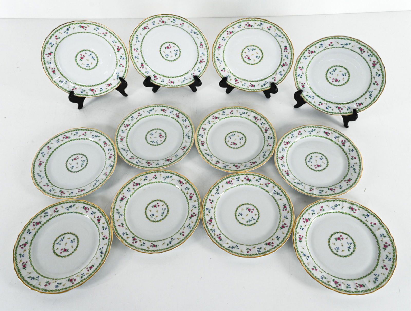 (12) BERNARDAUD LIMOGES "ARTOIS VERT" SALAD PLATES: Set of (12) fine porcelain salad plates from the Artois pattern, green colorway by Bernardaud Limoges. Dimensions: Dia. 8.5" Condition: No issues to note.
