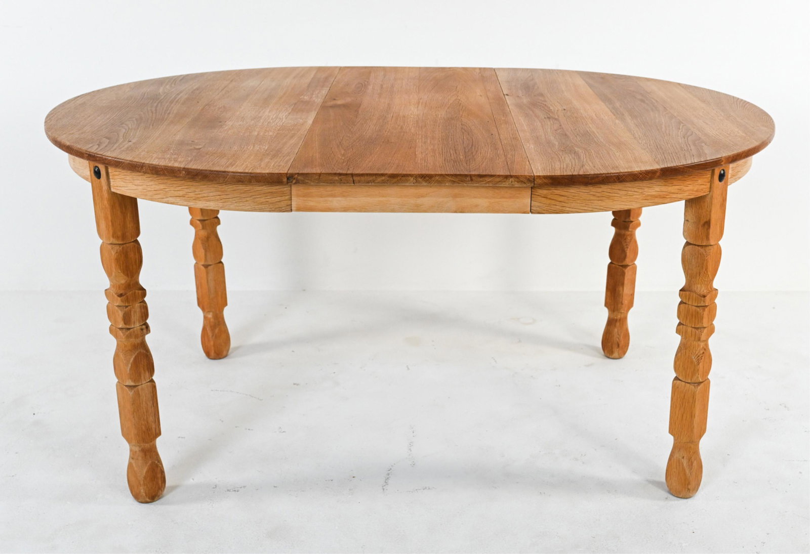 MANNER OF KJAERNULF OAK EXTENSION DINING TABLE (1 of 10)