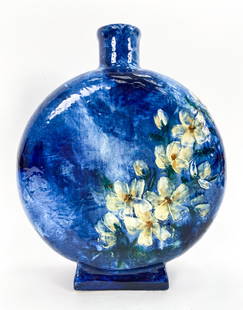 A. VALENTINE FOR T.J. WHEATLEY POTTERY 1880 VASE: Large Barbotine flask with floral motif. Marked underneath. Dimensions: H 13" x W 10.75" x D 3" Condition: A few spots of light crazing to glaze. Stress crack along right edge, with some glaze losses