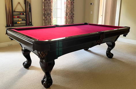 BRUNSWICK BILLIARDS POOL TABLE: Marked Brunswick Billiards on side. Including table and wall hanging rack with balls, sticks. Dimensions: H 31" x W 97.5" x D 54.5" Condition: A few small gouges to lacquer. Some rubs and scuffs to le