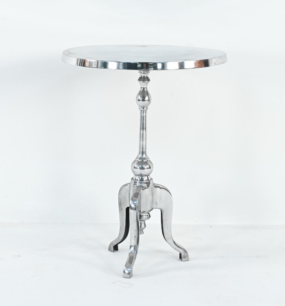 MODERN POLISHED ALUMINUM BISTRO TABLE: Dimensions: H 31" x Dia. 23" Condition: A few light surface scratches and scuffs, a couple pits.