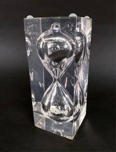 LUCITE HOURGLASS SCULPTURE ATTR. PIERRE GIRAUDON: Late Mid-Century Modern floating hourglass in lucite. This pop art piece, sculpture, paperweight is attributed to Pierre Giraudon known for suspending items in lucite. C. 1970s. Dimensions: H 6.5" x W