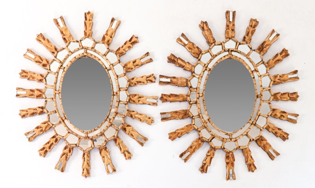 PAIR OF MID-CENTURY ITALIAN GILT SUNBURST MIRRORS: No labels. Dimensions: H 23" x W 19.5" x D 1.5" Condition: Intentionally distressed surface.