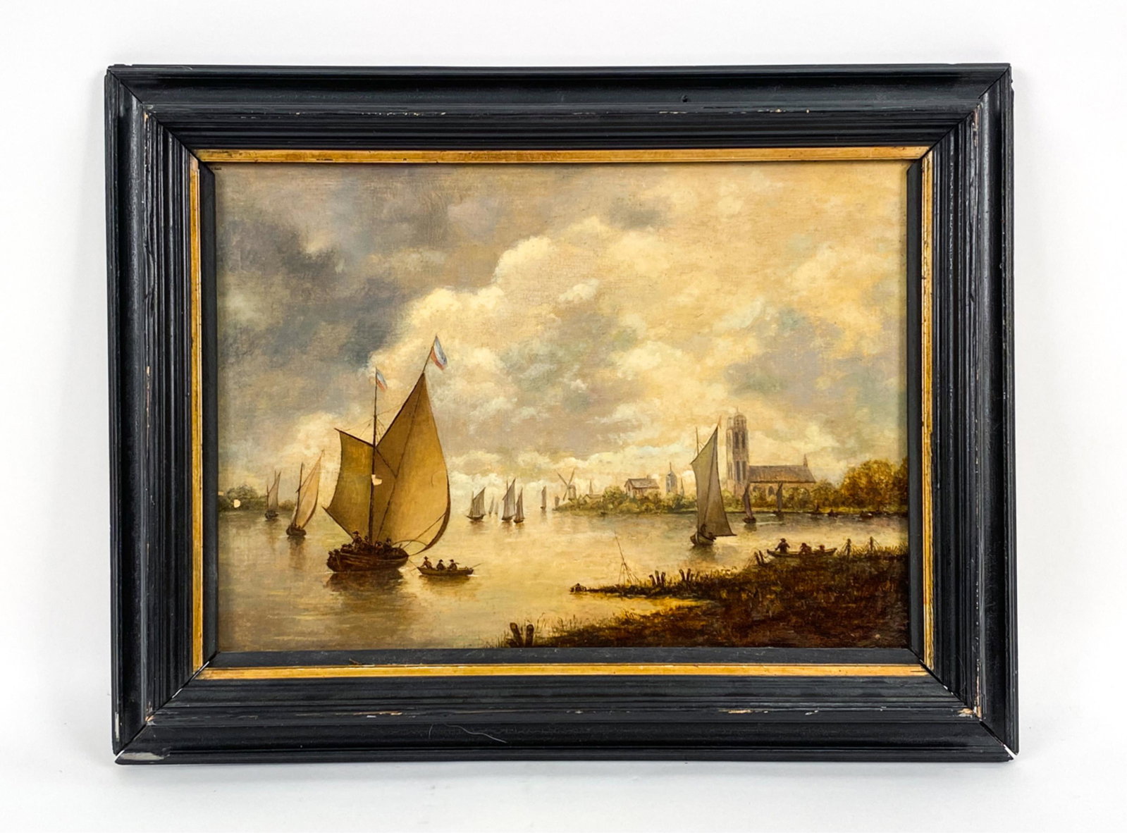 DUTCH OLD MASTER-STYLE WATER VIEW OIL ON PANEL: 17th century-style oil on old panel. With cradled back. Dutch ships at sail with a village and figures beyond. Dimensions: (Frame) H 15.5" x W 19.75", (Panel) H 11.25" x W 15.75" Condition: Painting w